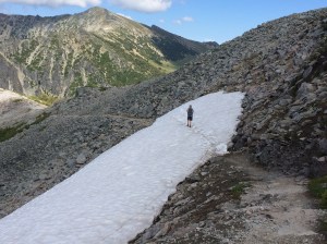 Crossing the dangerous snow-covered path.