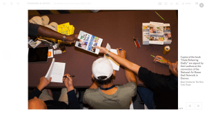 That's my bald dome in the lower right signing the book.